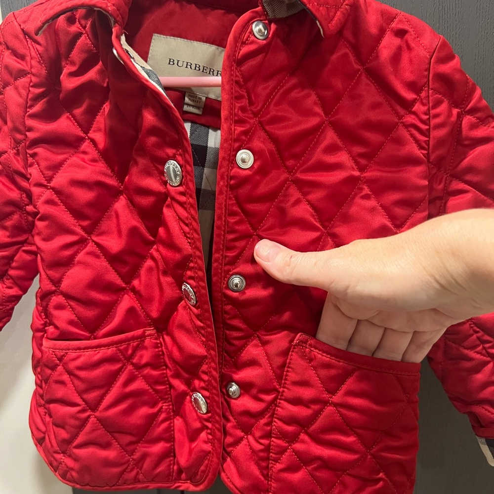 Red quilted Burberry jacket, size 2T